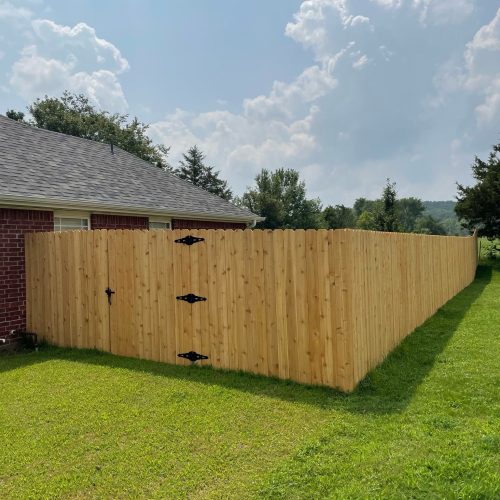 Wood fence installation in Rogers, AR